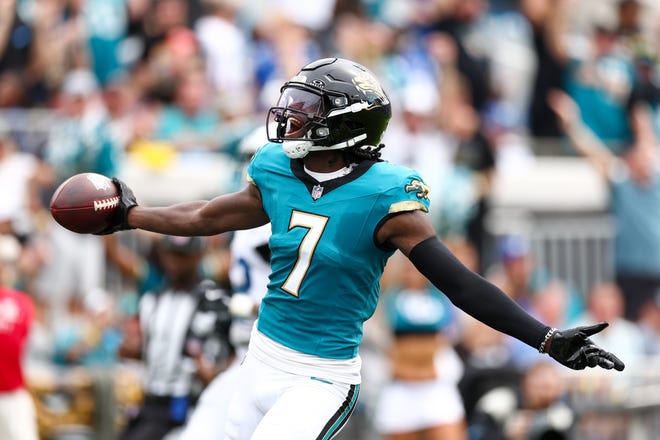 Oct 6, 2024; Jacksonville, Florida, USA; Jacksonville Jaguars wide receiver Brian Thomas Jr. (7) scores a touchdown against the Indianapolis Colts in the second quarter at EverBank Stadium. Mandatory Credit: Nathan Ray Seebeck-Imagn Images