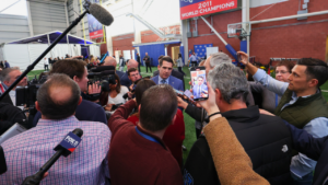 Viral ‘Giants Hire Harbaugh’ Claim Exposed—Ravens Roster Still Lists Him As Head Coach